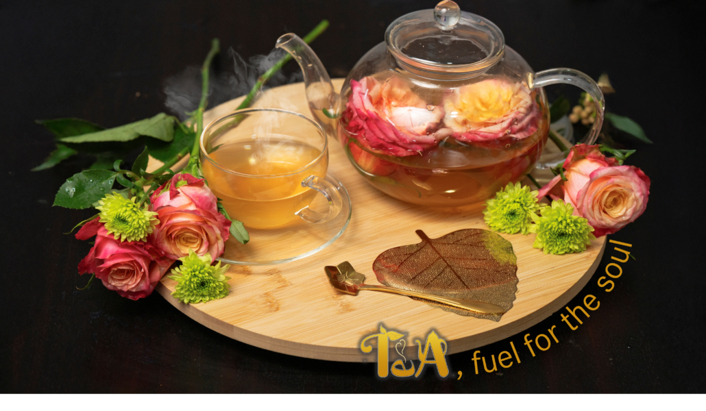 A cup of tea and tea pot with flowers Tea, fuel for the soul