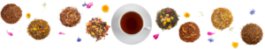 Cup of tea with tea blends and flowers